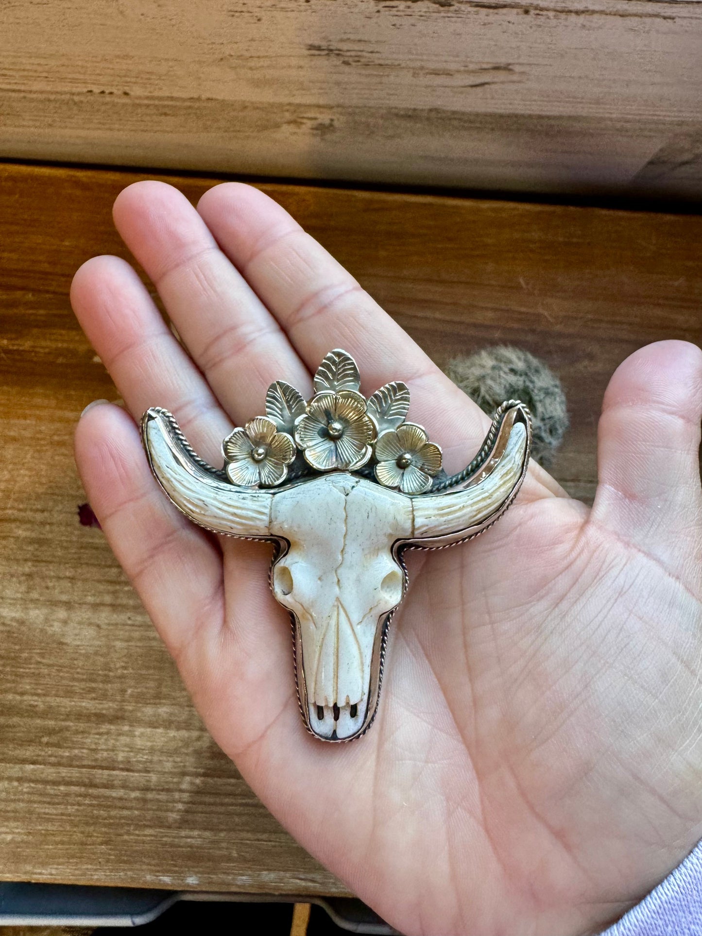 Big Antler longhorn with turquoise pendant with flowers
