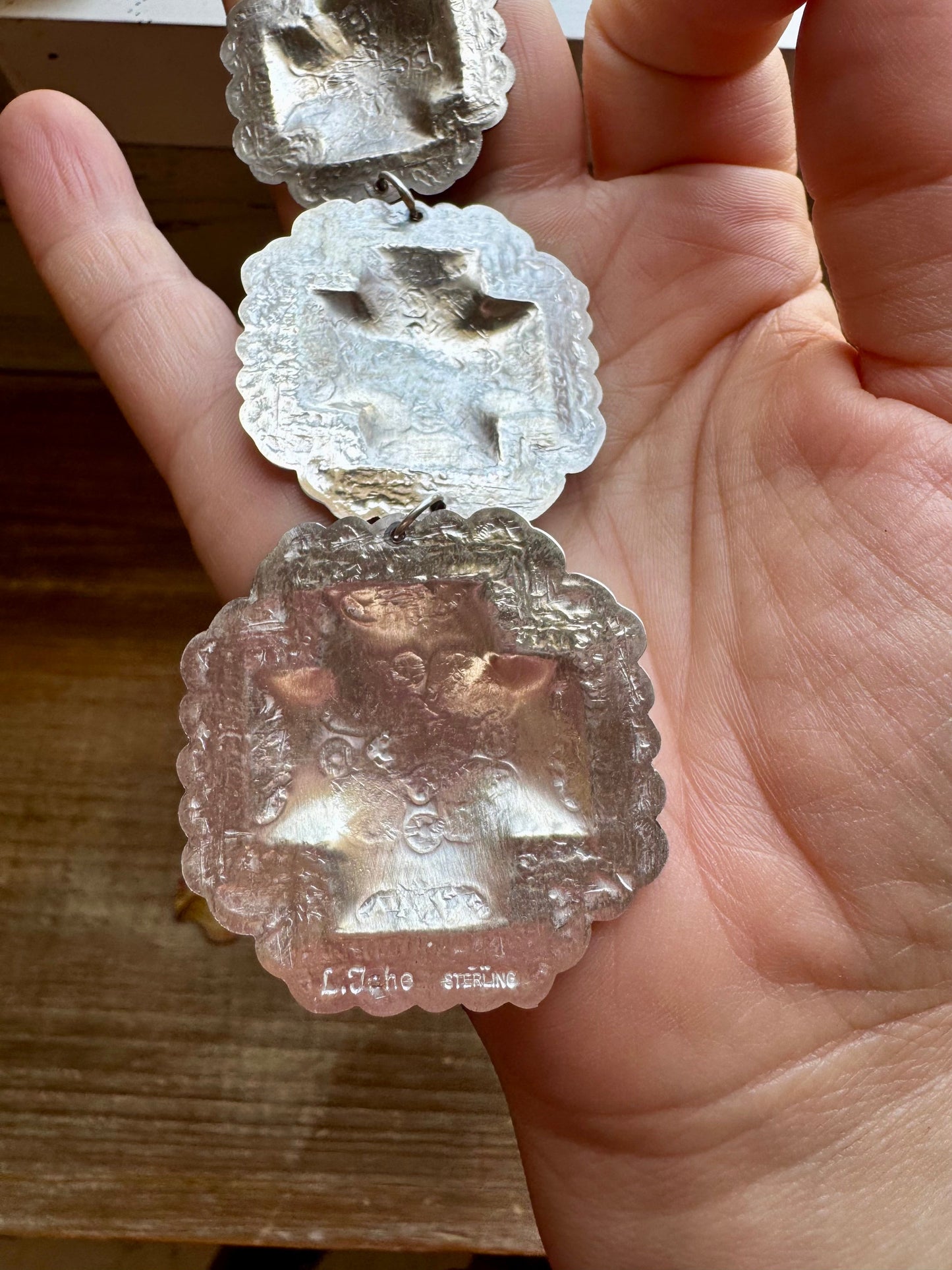 hree-Tier Concho Statement Earrings – Sterling Silver, Native Made by Leander & Rhonda Largo